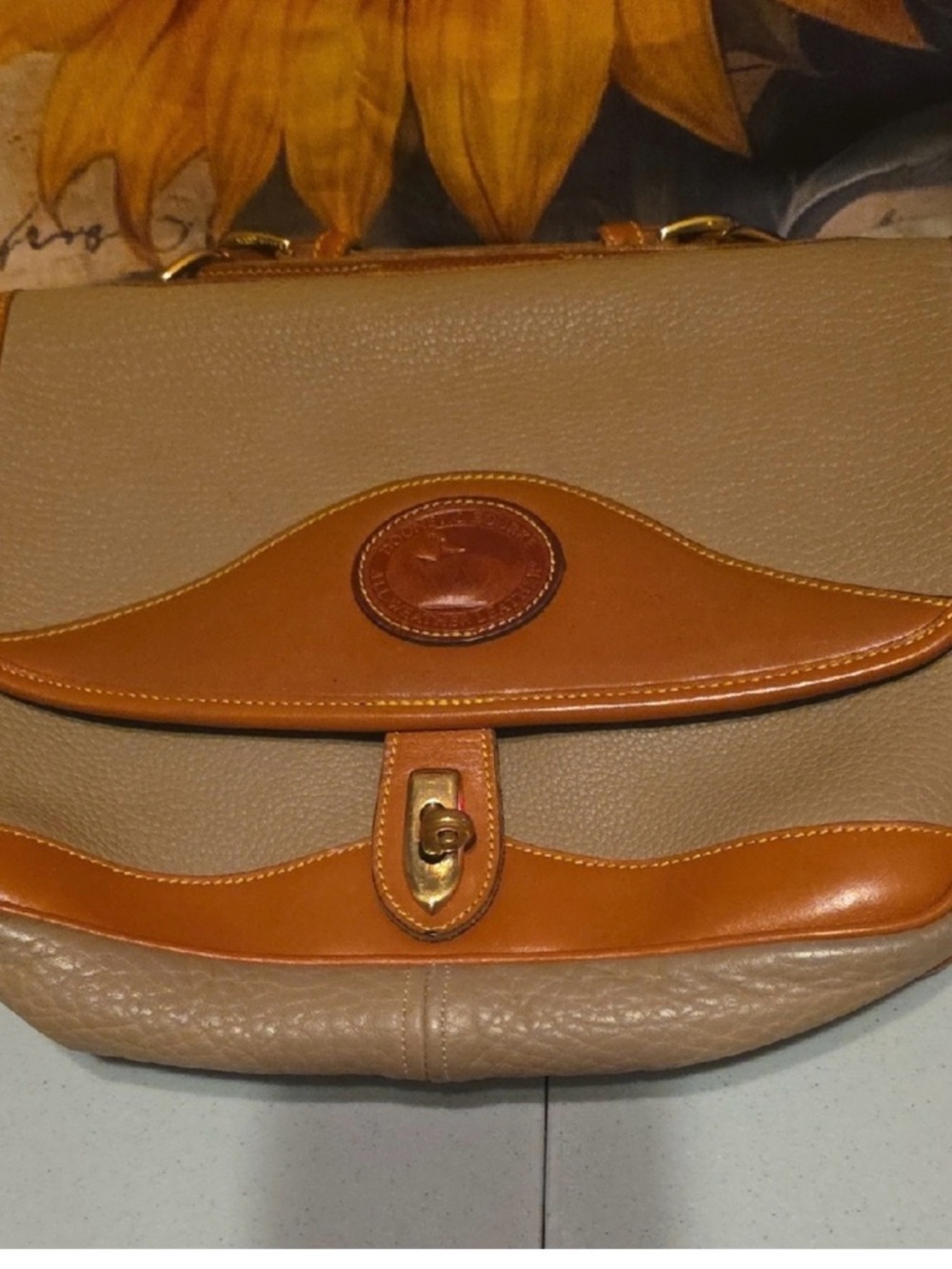 Dooney & Bourke Tan and Brown Leather Duck Medallion Bag Detail
